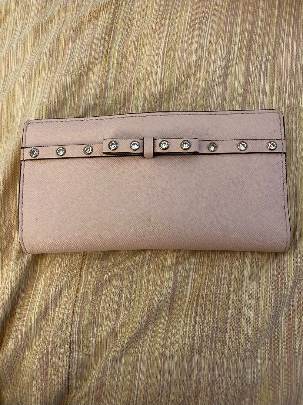 kate spade blush pink bow-studded continental wallet